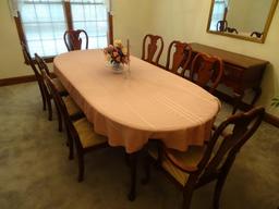 Oval dining room table w/ 8 chairs, 44"W x 100" L x 29"H-(table top needs to be refinished).