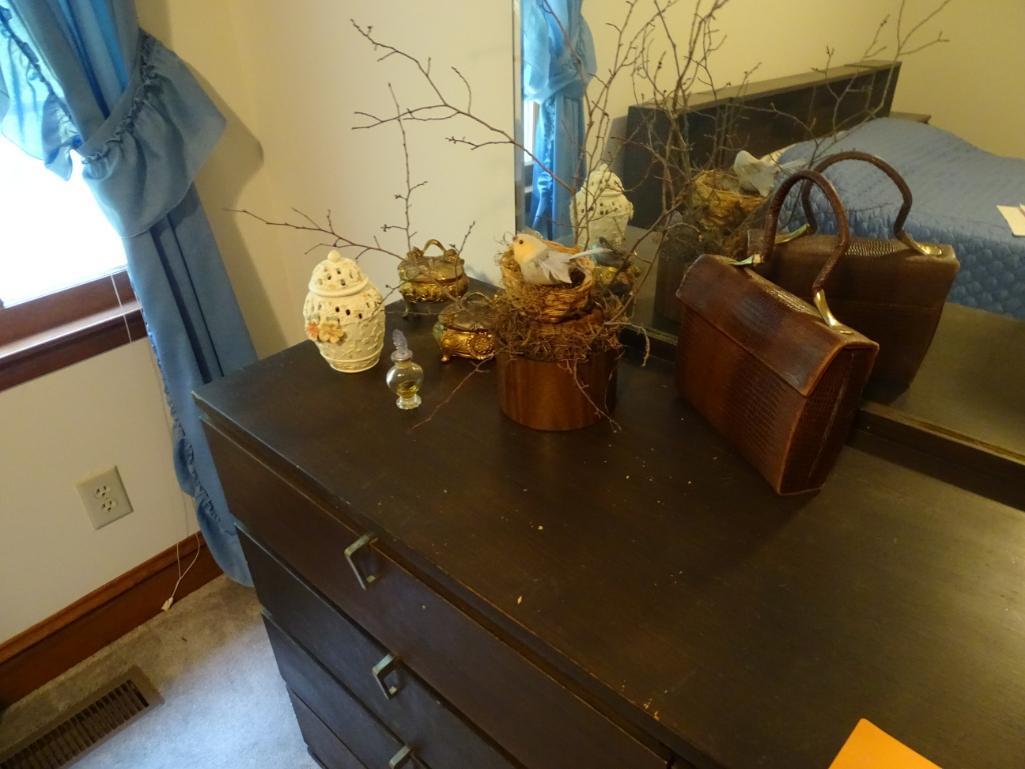 Items on Dresser: vintage pocketbook and knickknacks