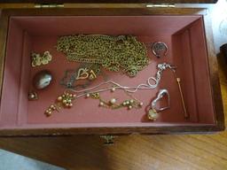 Costume Jewelry on table and in jewelry box