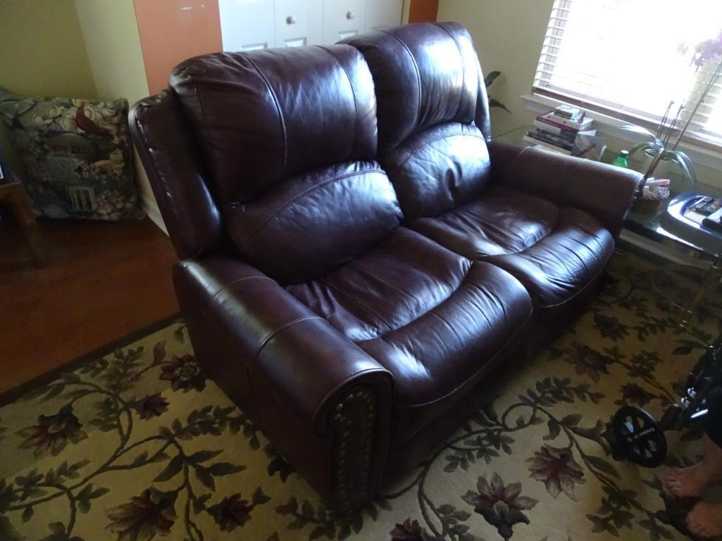 Brown Leather Loveseat from Rooms to Go-62"L x 33"D x 45" H.