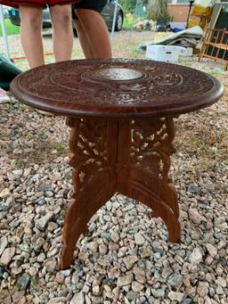 Wooden Asian-inspired occasional table with inlay. Top and legs are two separate pieces.