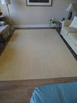 Light yellow rug w/ flecks of green-very good condition. 7'6" x 10'5".