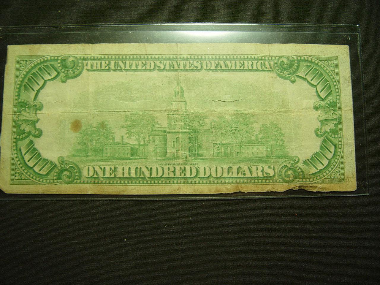 1928 $100 Gold Certificate- Note has two horizontal splits