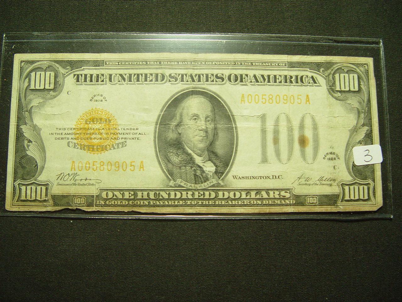 1928 $100 Gold Certificate- Note has two horizontal splits