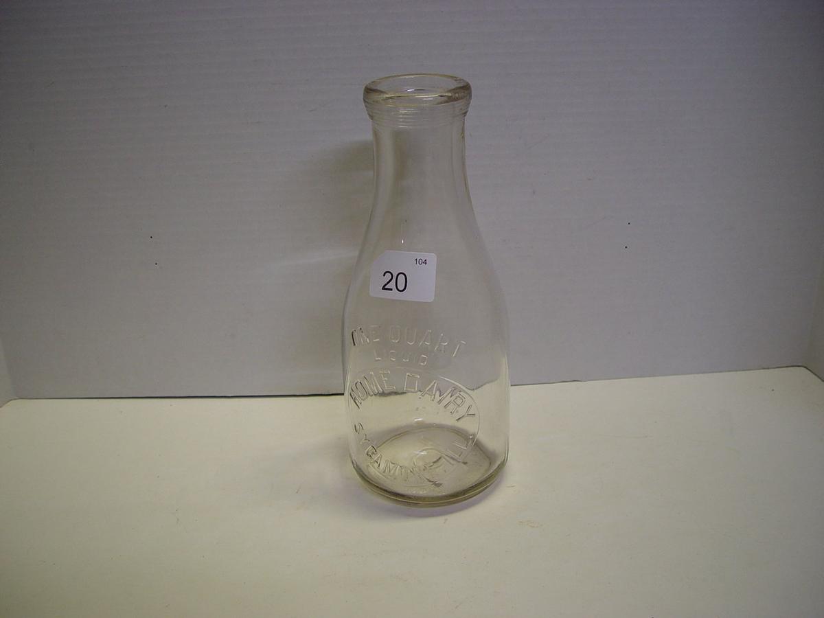 1 quart Home Dairy Sycamore IL Dairy Embossed milk bottle. Very clean