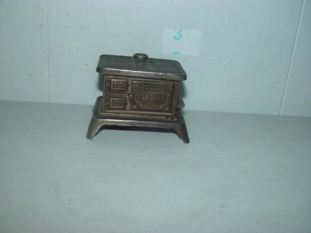 2 1/4" Pet Stove Cast Iron Bank