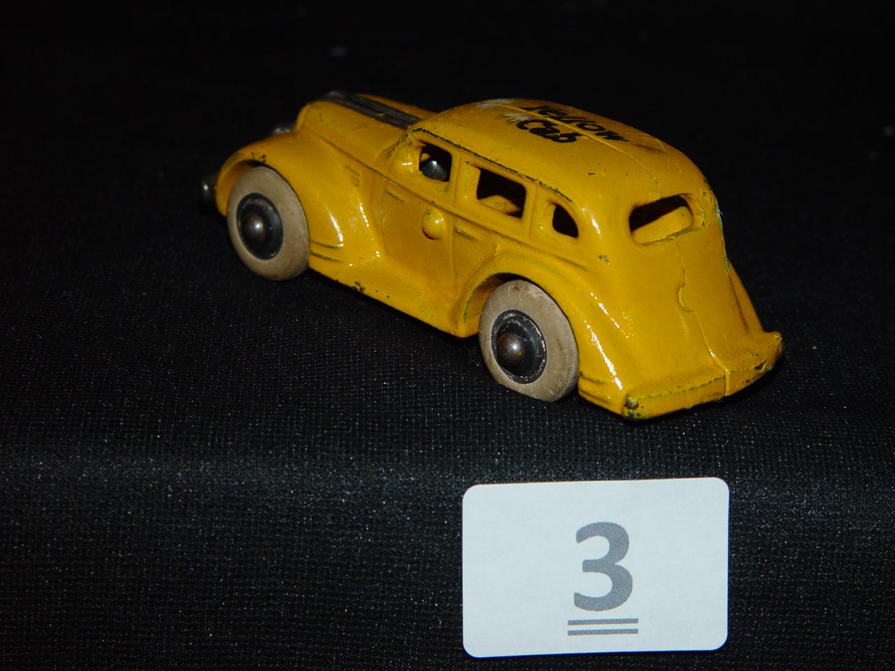 Cast Iron Yellow Cab 4"L Incised "Pontiac USA" on Inside of Car