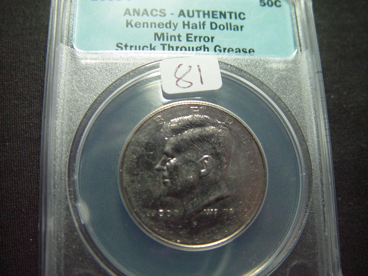 Mint Error: 2009 Kennedy Half Struck Through Grease  ANACS -Authentic