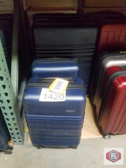 Travelers choice suitcase (2 lg 2 sm)