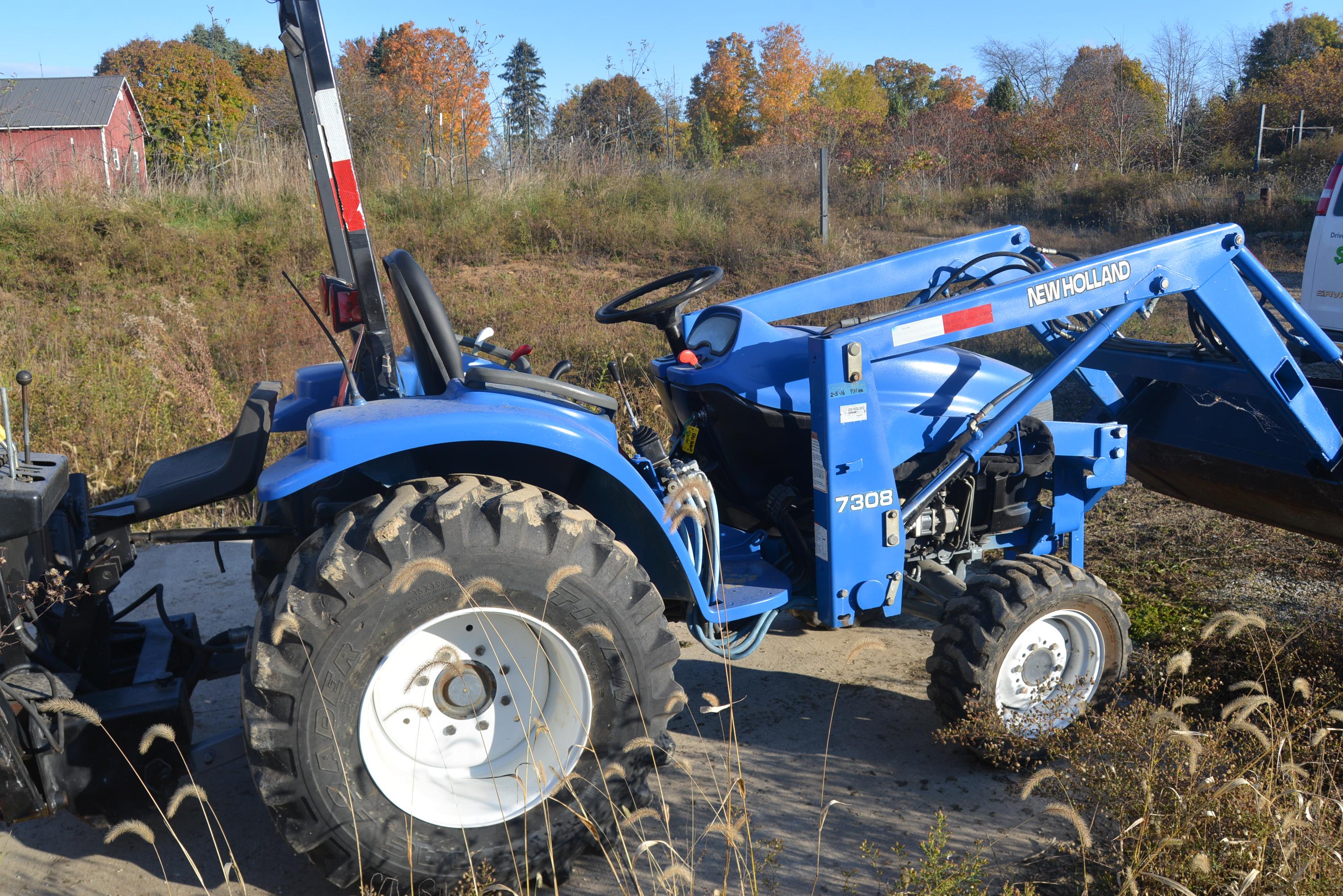 New Holland TC33 Tractor & Kelley 3-Pt. Backhoe