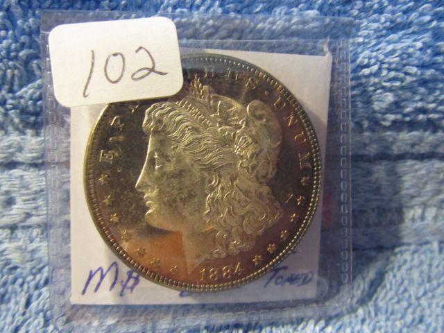 1884 MORGAN DOLLAR GEM BU P-L TONED