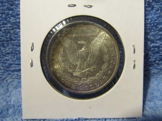 1884S MORGAN DOLLAR (REV. TONING) AU