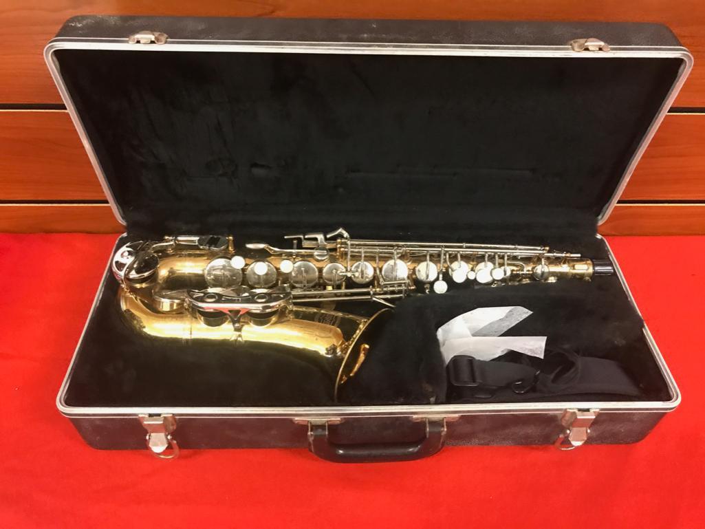 The Selmer Company Bundy 11 Alto Saxophone with case, finish is tarnished