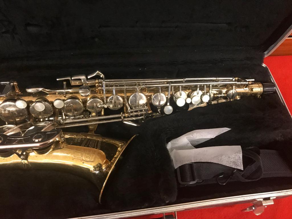 The Selmer Company Bundy 11 Alto Saxophone with case, finish is tarnished