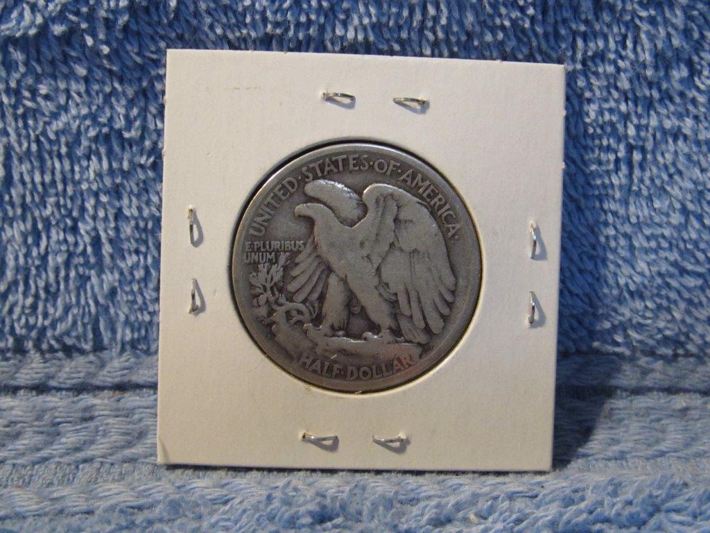 1917D REV. WALKING LIBERTY HALF VG