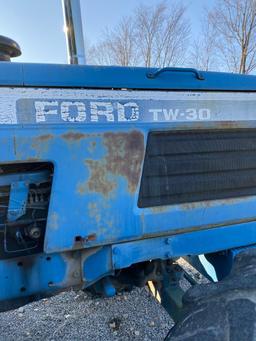 Ford TW30 dual power tractor 175 hp weights front and rear, shows 4900 hrs