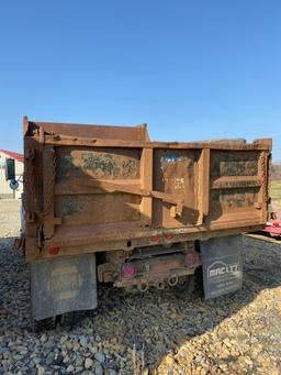 International 4700 T444E dump truck, 119,965 miles