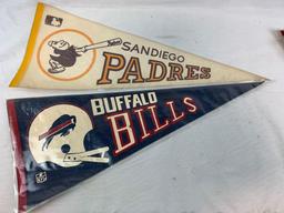 Group of vintage pennants, Phillies, Orioles, Padres, Bills, Cowboys, Jets