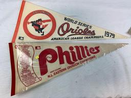 Group of vintage pennants, Phillies, Orioles, Padres, Bills, Cowboys, Jets