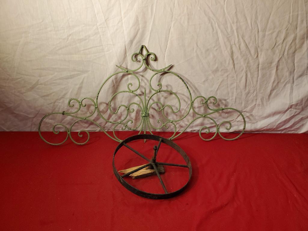 Metal wall embellishment, 35 x 16 inches, and vintage 8 inch metal wheel