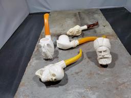 4 pipes, White bird/dog no markings, White skeleton hand no markings, White man with turban no