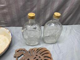 Water bowl, 2 glass bottles, and Chicken trivet