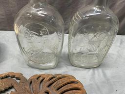 Water bowl, 2 glass bottles, and Chicken trivet