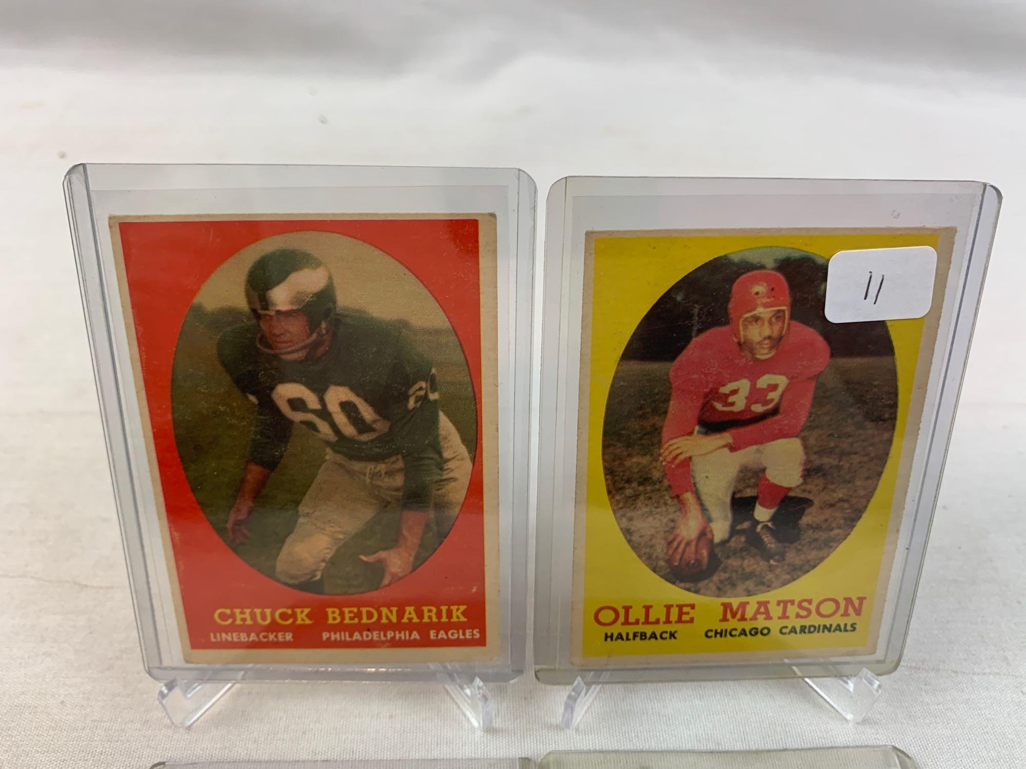 Four 1958 Topps Football cards - Matson, Bednarik, Morrall & Conerly