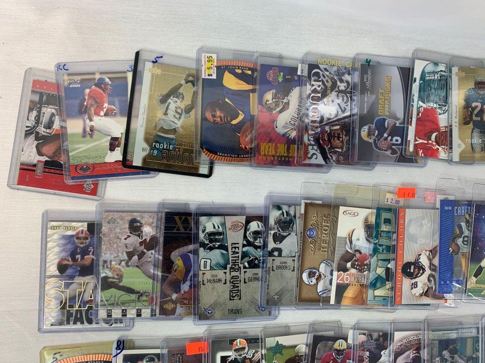 Lot of 105 Serial #'D football cards including Moss, Young, James, Davis, Harrison, Etc.