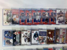 Lot of 100 Serial #'D Football cards including Faulk, Vick, Singletary, Woodson, Etc.