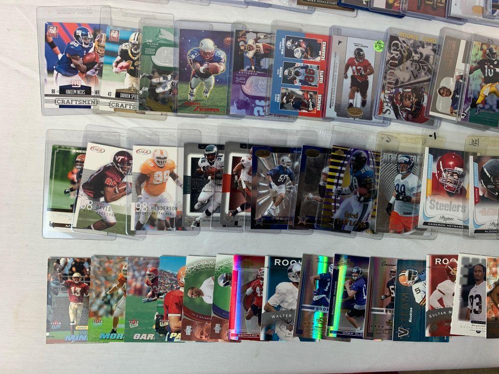 Lot of 100 Serial #'D Football cards including Faulk, Vick, Singletary, Woodson, Etc.