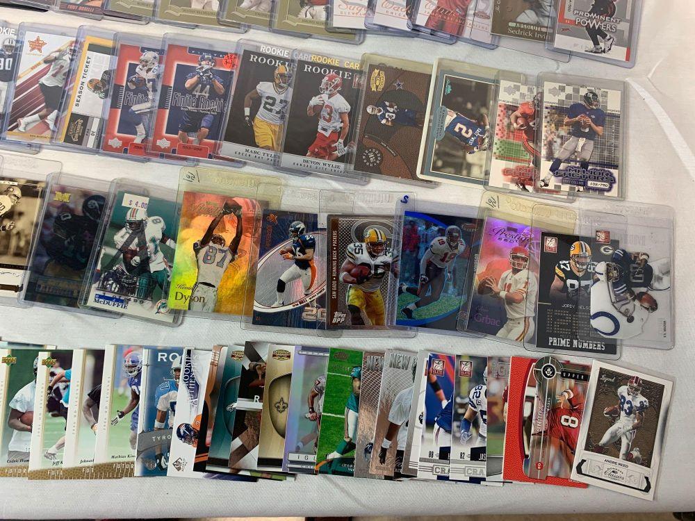 Lot of 100 Serial #'D Football cards, lots of stars