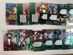 Lot of 100 Serial #'D cards including Charles Woodson, Marino, Steve Young, Moon,