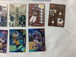 Lot of 21 Serial #'D Football star cards. Franco Harris, Davis, Carter, Urlacher,