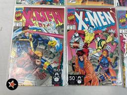 (7) X-Men Comic Books - Issues: 1, 1, 1, 1, 2, 3