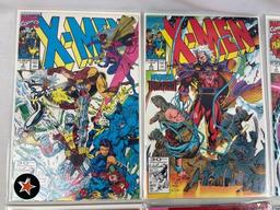(7) X-Men Comic Books - Issues: 1, 1, 1, 1, 2, 3
