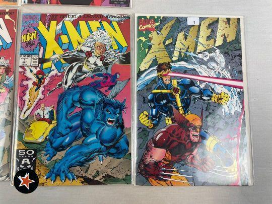 (7) X-Men Comic Books - Issues: 1, 1, 1, 1, 2, 3