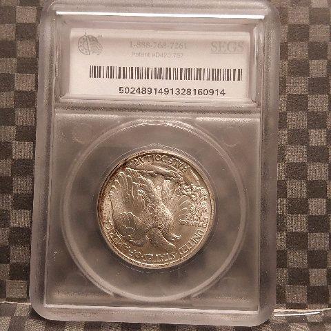 1939 WALKING LIBERTY HALF IN SEGS MS65 HOLDER