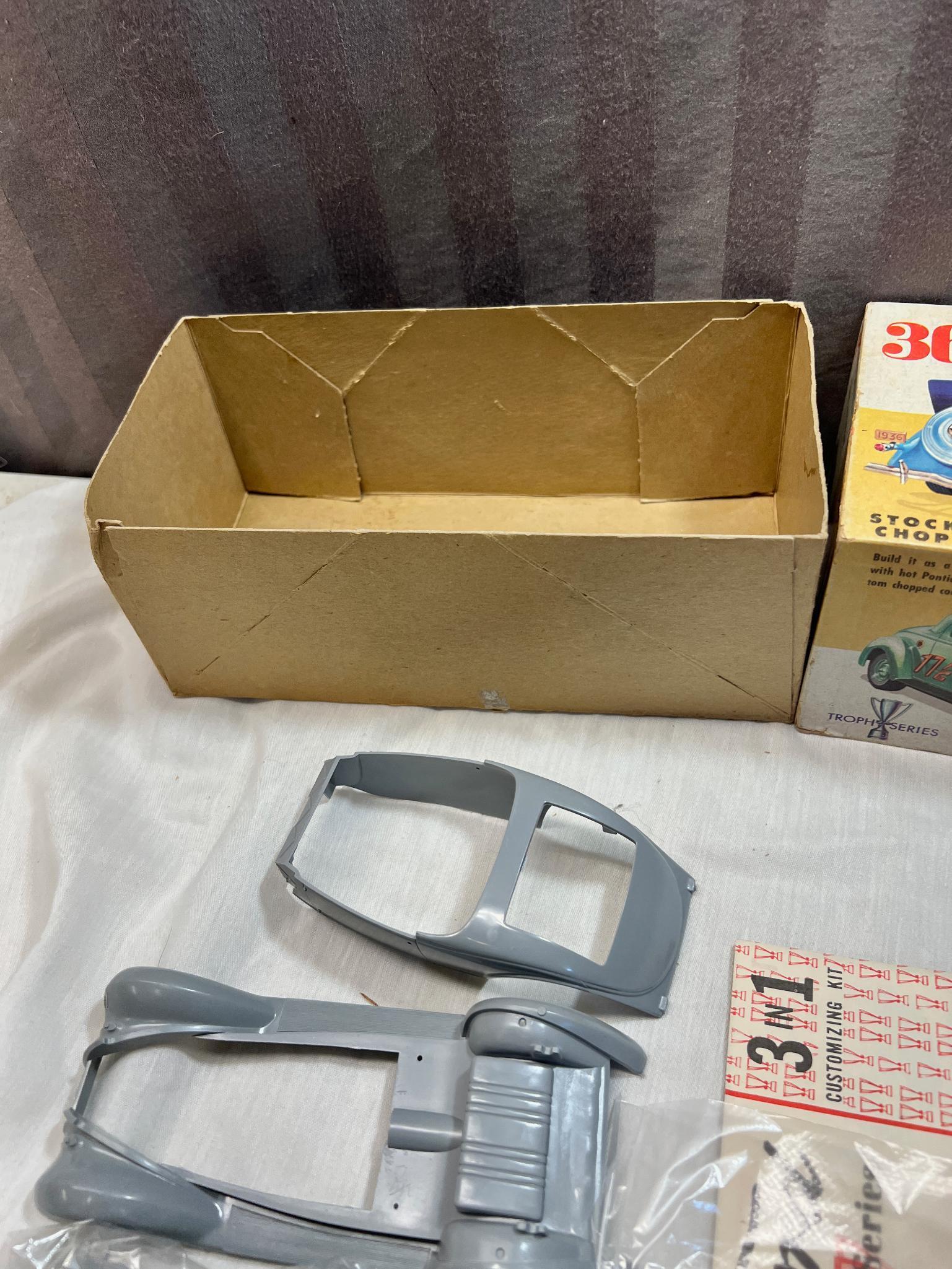 Vintage 1/25th Scale 1936 Ford Customizing model kit, appears contents are factory sealed, see pics