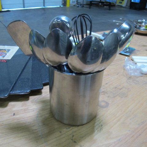stainless container of ladels, spoons, whisk & tenderizer