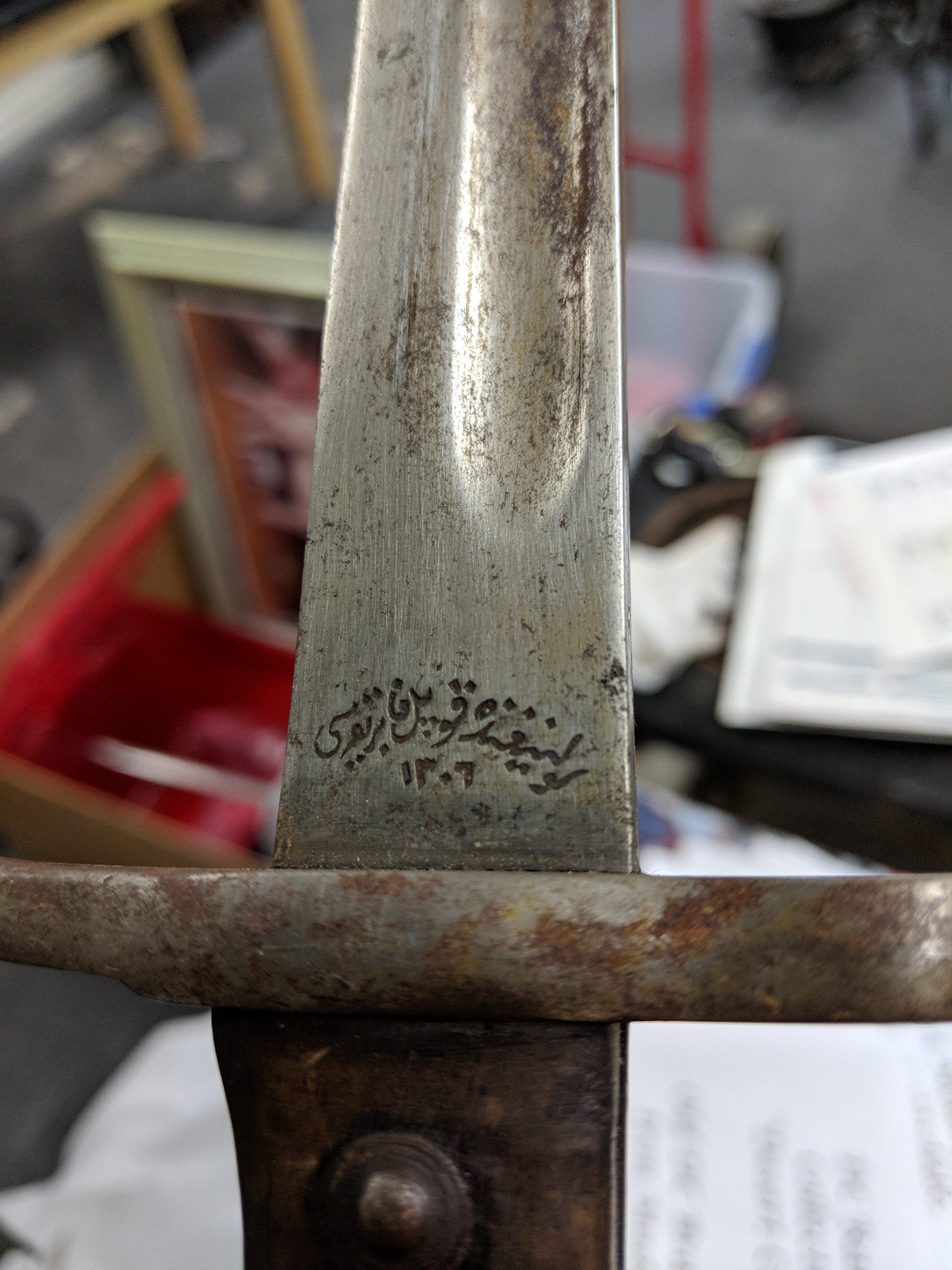 Sword with Illegible Markings