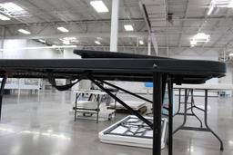 6' and 26" black plastic folding tables.
