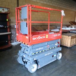 Skyjack scissor lift- works good, 19' platform height, 32"w