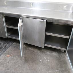 stainless table w/ back & side splash & cabinets under