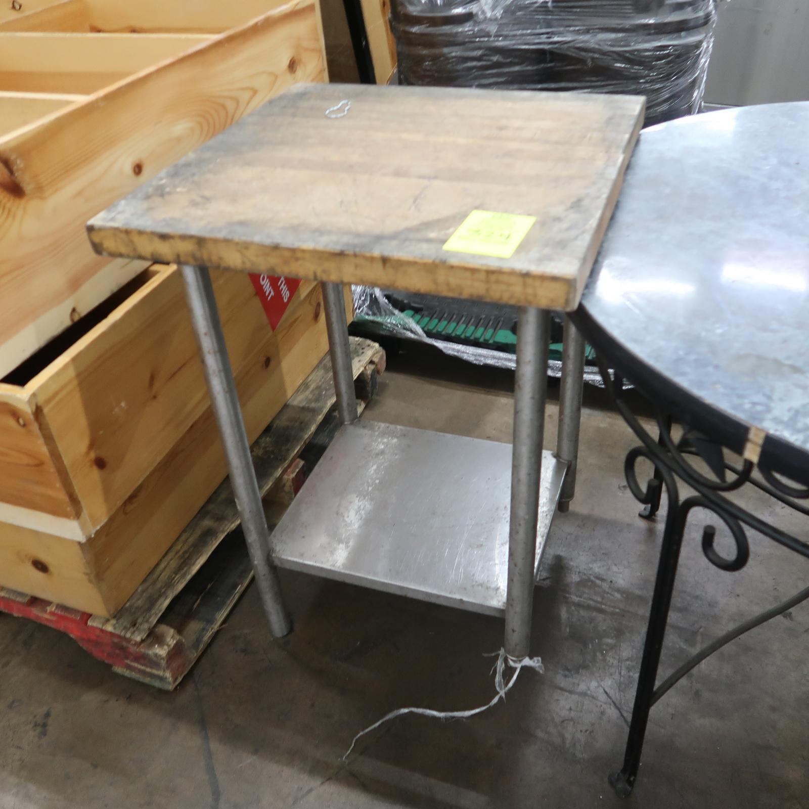 butcher block table on stainless base