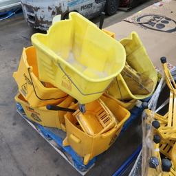 pallet of mop buckets