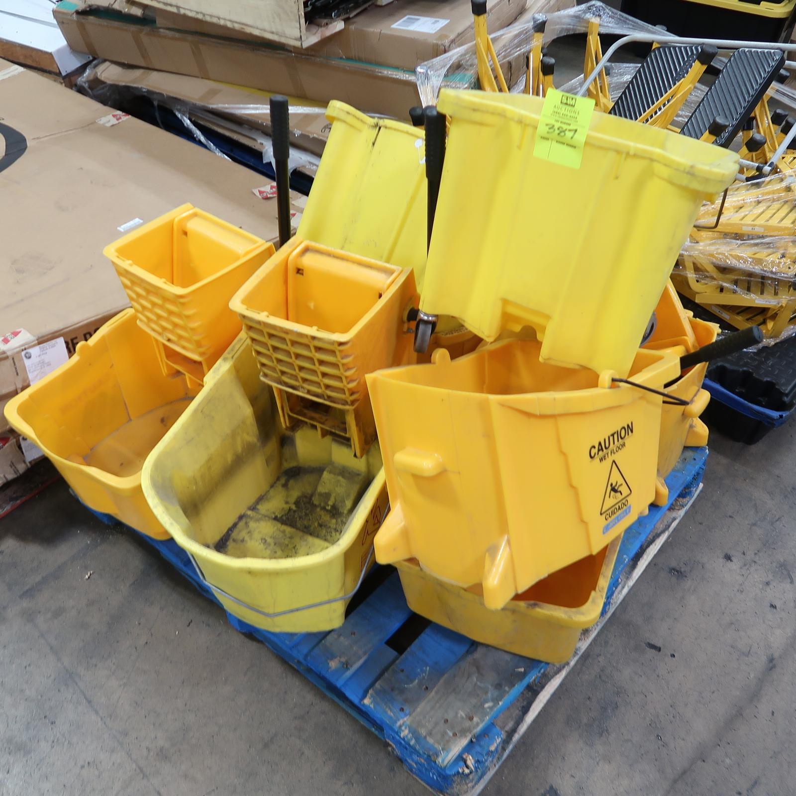 pallet of mop buckets