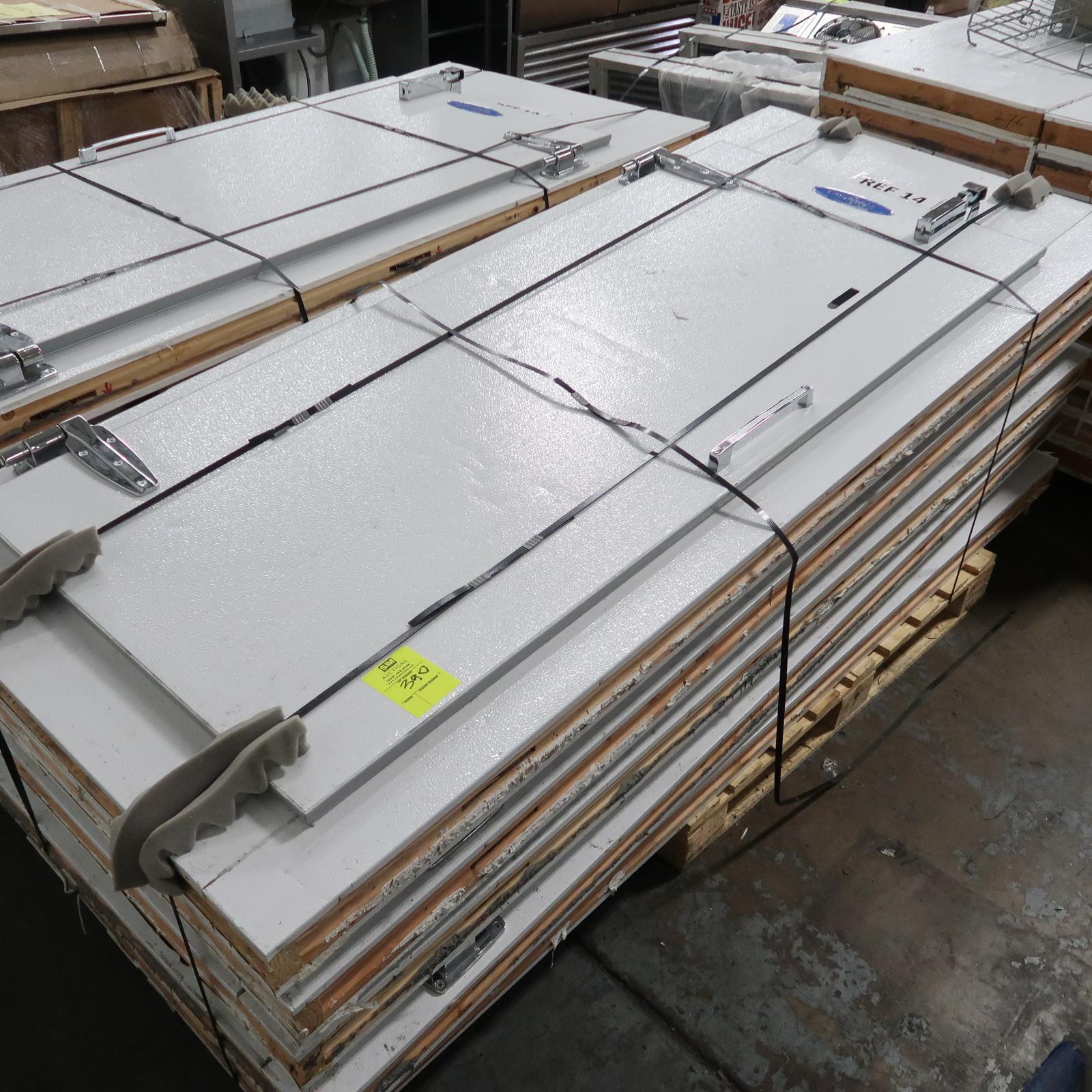 pallet of walk-in man-doors, mounted in panels