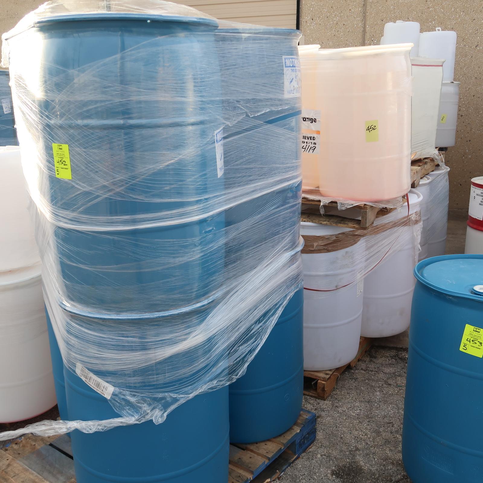 pallets of plastic barrels