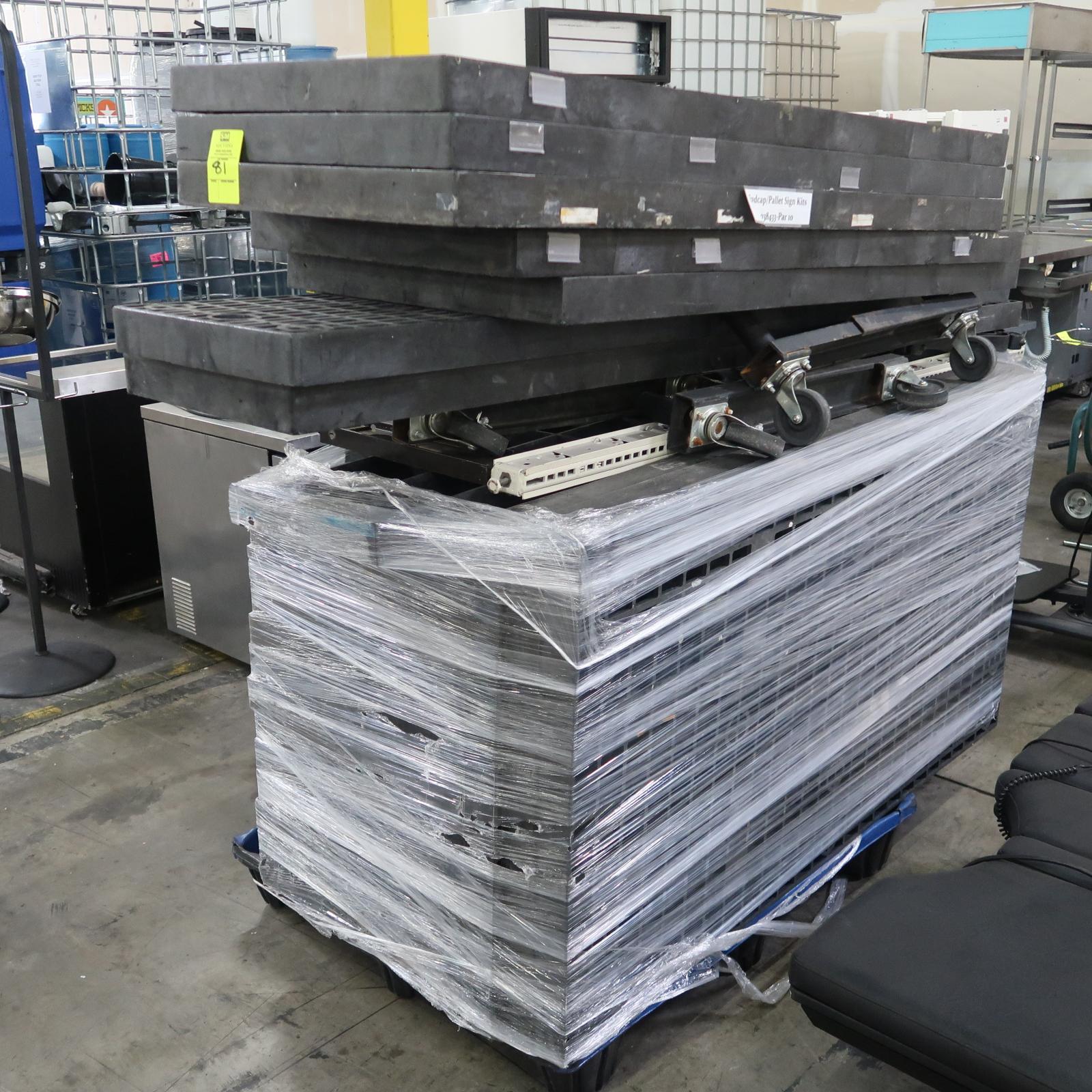 pallet of black plastic plant merchandisers